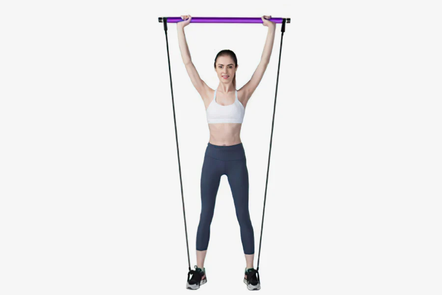 Overhead press with Pilates bar